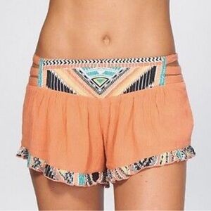 Rip curl sun warrior rust colored flow shorts size small.